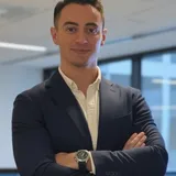 Ömer Batuhan Tandoğan in a navy suit — founder and CEO of Noderan